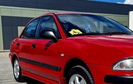Mitsubishi Carisma I, 1999 год, 395 000 рублей, 11 фотография
