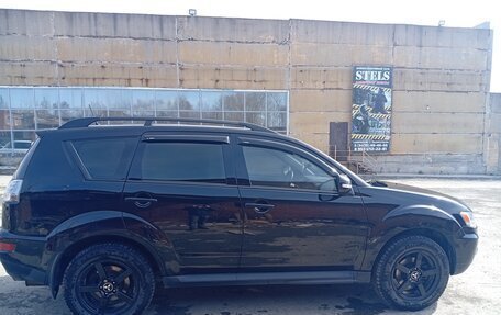 Mitsubishi Outlander III рестайлинг 3, 2011 год, 910 000 рублей, 14 фотография