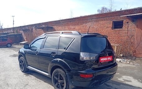 Mitsubishi Outlander III рестайлинг 3, 2011 год, 910 000 рублей, 9 фотография