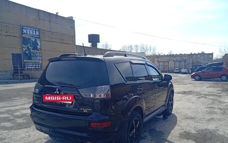 Mitsubishi Outlander III рестайлинг 3, 2011 год, 910 000 рублей, 13 фотография
