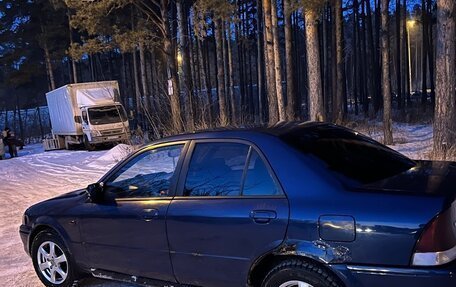 Ford Laser IV, 2001 год, 170 000 рублей, 5 фотография