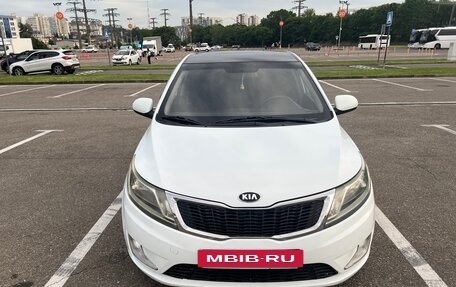 KIA Rio III рестайлинг, 2013 год, 800 000 рублей, 28 фотография