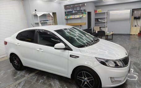 KIA Rio III рестайлинг, 2013 год, 760 000 рублей, 15 фотография