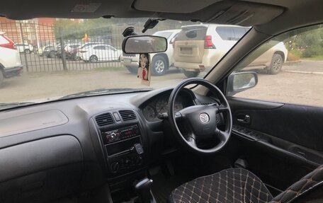 Mazda Familia Y10, 1999 год, 285 000 рублей, 12 фотография