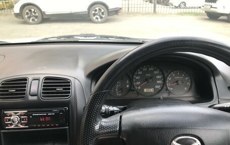 Mazda Familia Y10, 1999 год, 285 000 рублей, 10 фотография