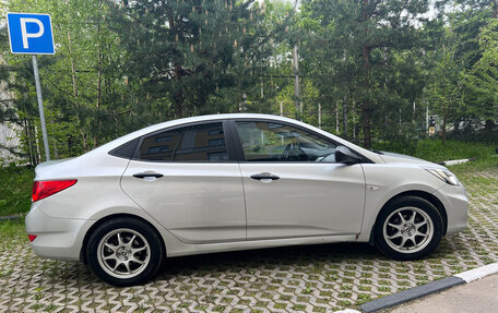 Hyundai Solaris II рестайлинг, 2011 год, 660 000 рублей, 16 фотография