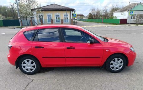 Mazda 3, 2008 год, 26 фотография