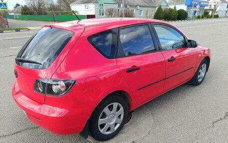 Mazda 3, 2008 год, 27 фотография