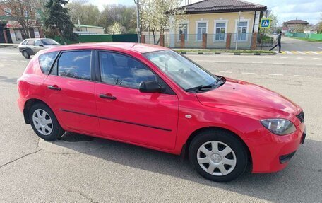 Mazda 3, 2008 год, 28 фотография