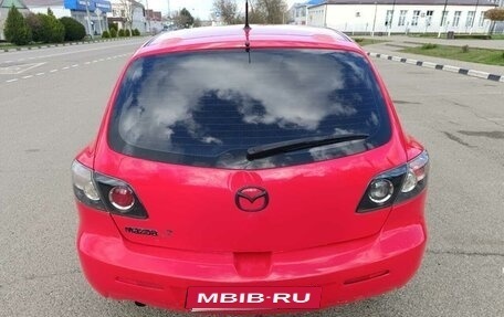 Mazda 3, 2008 год, 24 фотография