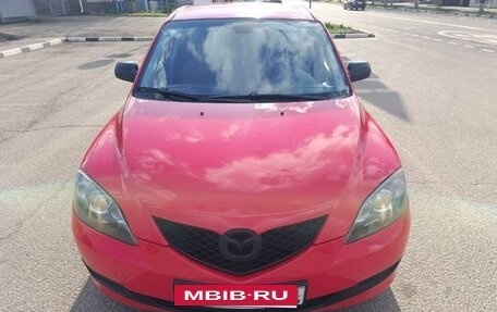 Mazda 3, 2008 год, 29 фотография