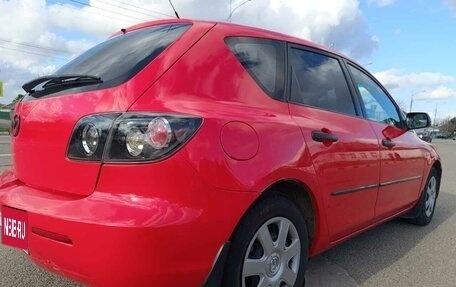 Mazda 3, 2008 год, 25 фотография