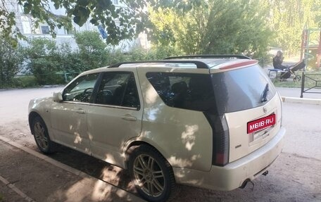Cadillac SRX II рестайлинг, 2009 год, 600 000 рублей, 6 фотография