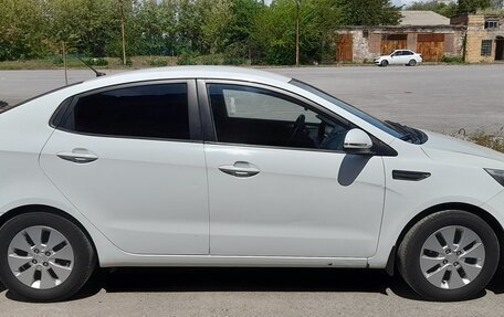 KIA Rio III рестайлинг, 2011 год, 820 000 рублей, 2 фотография