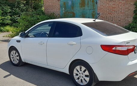 KIA Rio III рестайлинг, 2011 год, 820 000 рублей, 5 фотография