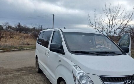 Hyundai Grand Starex Grand Starex I рестайлинг 2, 2012 год, 1 100 000 рублей, 2 фотография