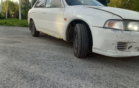 Mitsubishi Lancer VII, 1997 год, 145 000 рублей, 7 фотография