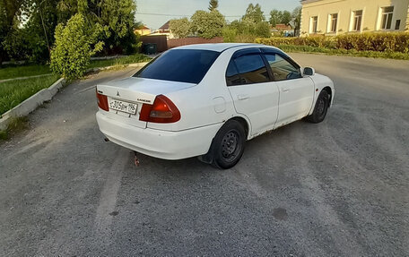 Mitsubishi Lancer VII, 1997 год, 145 000 рублей, 4 фотография