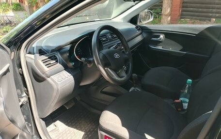 KIA Rio III рестайлинг, 2012 год, 13 фотография
