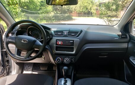 KIA Rio III рестайлинг, 2012 год, 18 фотография