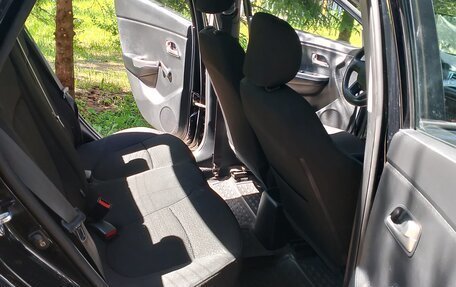 KIA Rio III рестайлинг, 2012 год, 21 фотография