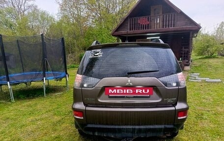 Mitsubishi Outlander III рестайлинг 3, 2011 год, 1 195 000 рублей, 4 фотография