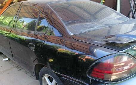 Pontiac Grand AM IV, 1999 год, 650 000 рублей, 9 фотография