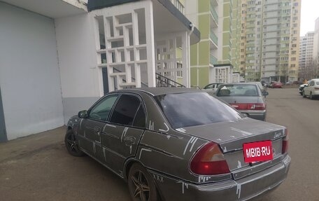 Mitsubishi Lancer VII, 1998 год, 155 000 рублей, 3 фотография
