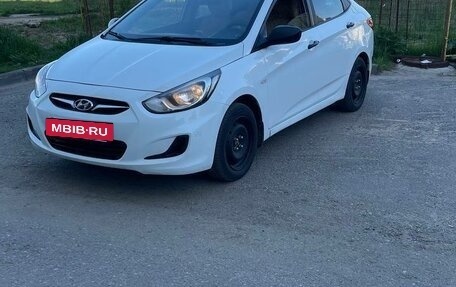 Hyundai Solaris II рестайлинг, 2011 год, 830 000 рублей, 13 фотография
