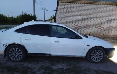 Mazda 323, 1997 год, 130 000 рублей, 10 фотография