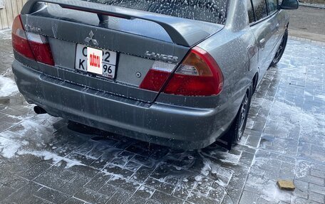 Mitsubishi Lancer VII, 1998 год, 360 000 рублей, 7 фотография