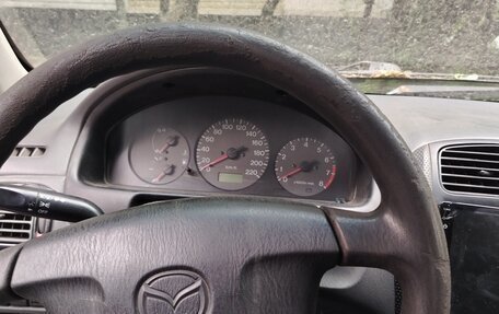 Mazda 323, 1999 год, 195 000 рублей, 4 фотография