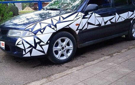 Mitsubishi Carisma I, 1998 год, 275 000 рублей, 19 фотография