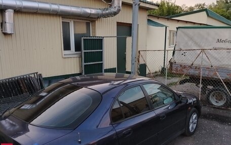Mitsubishi Carisma I, 1998 год, 275 000 рублей, 30 фотография
