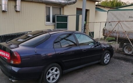 Mitsubishi Carisma I, 1998 год, 275 000 рублей, 29 фотография