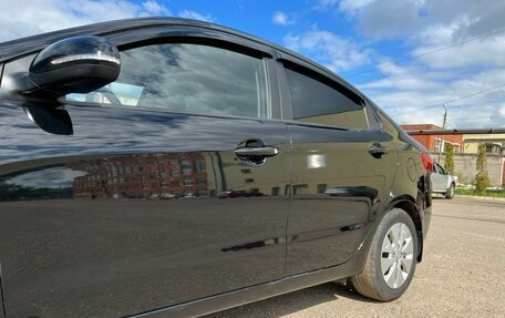 KIA Rio III рестайлинг, 2013 год, 950 000 рублей, 20 фотография