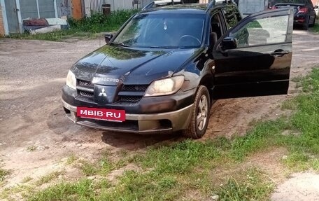 Mitsubishi Outlander III рестайлинг 3, 2003 год, 680 000 рублей, 10 фотография