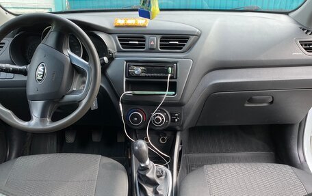 KIA Rio III рестайлинг, 2013 год, 900 000 рублей, 23 фотография