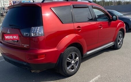 Mitsubishi Outlander III рестайлинг 3, 2011 год, 1 050 000 рублей, 4 фотография
