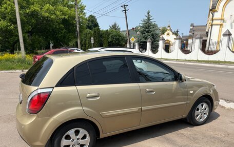 KIA Rio II, 2011 год, 690 000 рублей, 10 фотография