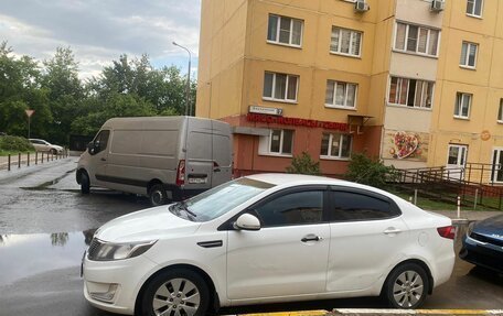 KIA Rio III рестайлинг, 2013 год, 690 000 рублей, 2 фотография