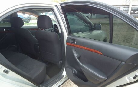 Toyota Avensis III рестайлинг, 2004 год, 699 000 рублей, 23 фотография