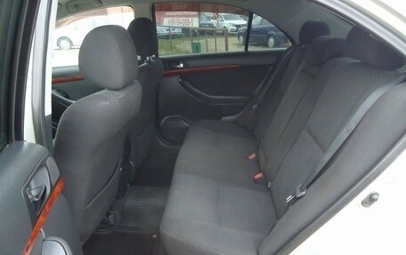 Toyota Avensis III рестайлинг, 2004 год, 699 000 рублей, 22 фотография