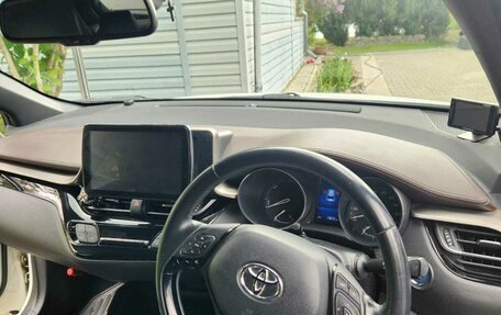 Toyota C-HR I рестайлинг, 2019 год, 2 150 000 рублей, 12 фотография