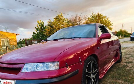 Opel Calibra, 1991 год, 370 000 рублей, 10 фотография