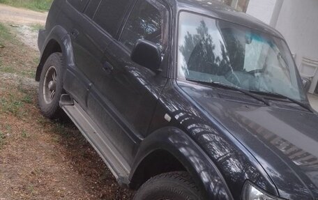 Toyota Land Cruiser Prado 90 рестайлинг, 1998 год, 870 000 рублей, 4 фотография