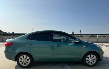 KIA Rio III рестайлинг, 2012 год, 690 000 рублей, 3 фотография