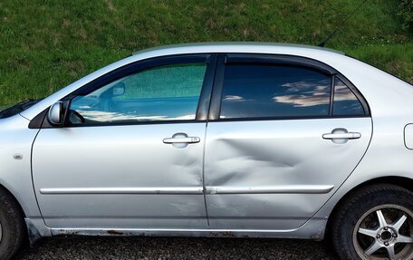 Toyota Corolla, 2004 год, 490 000 рублей, 8 фотография