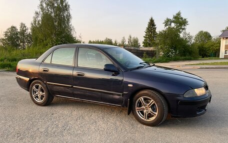 Mitsubishi Carisma I, 2002 год, 175 000 рублей, 24 фотография
