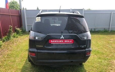 Mitsubishi Outlander III рестайлинг 3, 2011 год, 1 500 000 рублей, 4 фотография